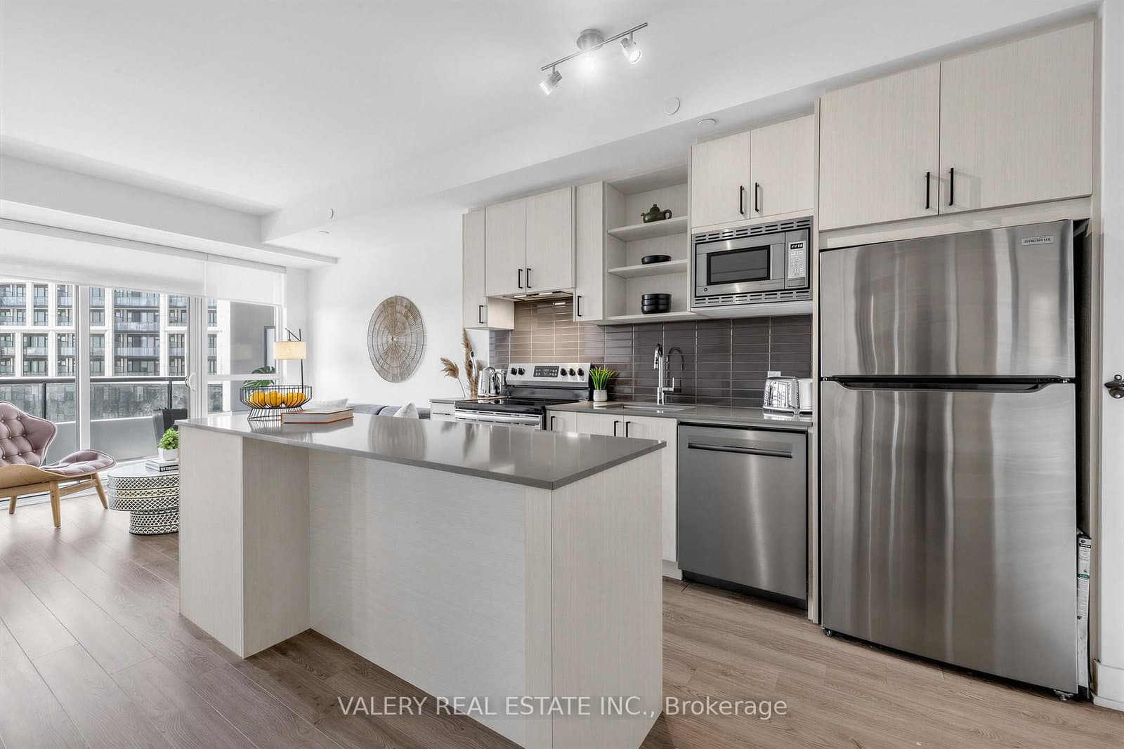 #411 - 60 George Butchart Drive